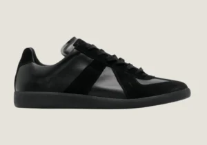 MM Black nappa leather with the iconic stitching at the back.